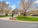 Charming two-story home with well-maintained lawn, two car garage and mature tree at 3140 S Legacy Park Blvd, Fort Mill, SC 29707