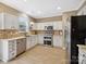 Bright kitchen featuring stainless steel appliances, white cabinets, and a tile backsplash at 3140 S Legacy Park Blvd, Fort Mill, SC 29707