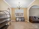 Inviting living room featuring a chandelier, and views to the front yard at 3140 S Legacy Park Blvd, Fort Mill, SC 29707