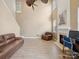Open living room with high ceilings, fireplace, and ample natural light at 3140 S Legacy Park Blvd, Fort Mill, SC 29707