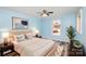 Cozy bedroom with natural light, stylish furnishings, and neutral color palette at 400 E 1St St, Cherryville, NC 28021