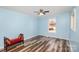 Bedroom features wood floors, natural light, and ample space at 400 E 1St St, Cherryville, NC 28021