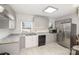 Bright kitchen with updated cabinets, granite countertops, and stainless steel appliances at 400 E 1St St, Cherryville, NC 28021