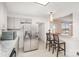 Charming kitchen features stainless steel appliances, granite countertops, and a breakfast bar at 400 E 1St St, Cherryville, NC 28021