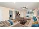 Staged living room with view to the kitchen and bar seating at 400 E 1St St, Cherryville, NC 28021