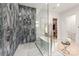 Luxurious bathroom featuring glass enclosed shower and freestanding tub at 401 Woodland St, Davidson, NC 28036