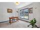 Bright office space with a large window, desk, and decorative wallpaper for a productive workspace at 413 19Th Avenue Ne Ct, Hickory, NC 28601