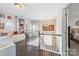 Elegant foyer featuring a staircase and built-in shelving for storage or display at 5601 Underwood Ave, Charlotte, NC 28213