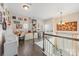 Bright hallway with a desk and built-in bookshelves offers a functional and organized workspace at 5601 Underwood Ave, Charlotte, NC 28213
