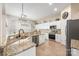 Bright kitchen featuring granite countertops, stainless steel appliances, and a functional layout at 5601 Underwood Ave, Charlotte, NC 28213