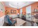 Stylish sitting room featuring shuttered windows, a decorative chandelier, and comfortable seating at 5601 Underwood Ave, Charlotte, NC 28213