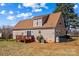 The exterior of the home from the backyard, showing a deck and neutral colored siding at 655 Mock Mill Rd, Statesville, NC 28677