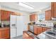 Functional kitchen with updated appliances, ample cabinetry, and a window over the sink providing natural light at 655 Mock Mill Rd, Statesville, NC 28677