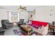 Inviting living room with lots of natural light, comfortable seating and cozy decor at 655 Mock Mill Rd, Statesville, NC 28677