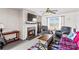 Cozy living room showcasing a fireplace, comfortable armchairs, and a large window for natural light at 655 Mock Mill Rd, Statesville, NC 28677