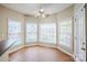 Sunlit breakfast nook with tile flooring and large windows offering pleasant outdoor views at 6916 Sardis Green Ct, Charlotte, NC 28270