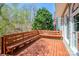 Spacious deck with built-in seating, perfect for outdoor entertaining and enjoying nature at 6916 Sardis Green Ct, Charlotte, NC 28270