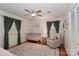 Stylish Bedroom with area rug, natural light, and comfortable seating at 737 Waverly Pl, Statesville, NC 28677