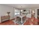 The dining area includes a chandelier, and updated white cabinetry at 737 Waverly Pl, Statesville, NC 28677