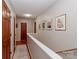 Upstairs hallway with hardwood floors, white walls and Gathering photos at 737 Waverly Pl, Statesville, NC 28677