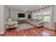 Bright and airy living room with hardwood floors, neutral tones, and natural light at 737 Waverly Pl, Statesville, NC 28677