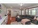 Comfortable living room featuring natural light, hardwood floors, and cozy seating at 737 Waverly Pl, Statesville, NC 28677