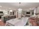 Open concept living space with dining room, kitchen, and sitting area provides ample space at 737 Waverly Pl, Statesville, NC 28677