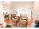 Open concept living room with view of stairs to second level and kitchen and dining at 7936 Cedarsmith Ct, Charlotte, NC 28217