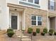 Charming brick front exterior boasts a welcoming front door and landscaped yard at 8260 Waxhaw Hwy, Waxhaw, NC 28173