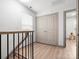 Upstairs hallway with closet and view of playroom at 8260 Waxhaw Hwy, Waxhaw, NC 28173