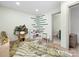 Inviting playroom with creative storage solutions and adjacent bathroom at 8260 Waxhaw Hwy, Waxhaw, NC 28173