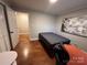 Bedroom with hardwood floors at 842 E Woodlawn Rd, Charlotte, NC 28209