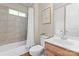 Bathroom featuring a tub with shower, toilet, and a wood vanity with a sink at 1119 Lytton Ln, Matthews, NC 28104