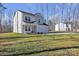 Charming two-story home with a well-manicured lawn, a two-car garage, and a welcoming front porch at 126 Orville Rd, Statesville, NC 28677