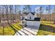 Aerial view of a well-maintained home with a manicured lawn and attached two-car garage at 126 Orville Rd, Statesville, NC 28677