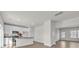 Bright and airy kitchen area featuring white cabinets, granite countertops, and stainless steel appliances at 126 Orville Rd, Statesville, NC 28677