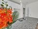 Granite kitchen island with stainless steel sink and faucet, complemented by a decorative flower arrangement at 126 Orville Rd, Statesville, NC 28677