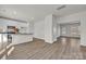 Open concept living room featuring new wood flooring and bright, natural light at 126 Orville Rd, Statesville, NC 28677