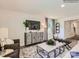 This living room features modern decor, a TV, a decorative cabinet, and a stylish coffee table at 13337 Hampton Bay Ln, Charlotte, NC 28262