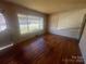 Hardwood floors, with a bright window view, define this inviting living space at 1403 Oakwood Ave, Kannapolis, NC 28081