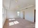 Primary bedroom with tray ceiling at 1829 Augustine St, Monroe, NC 28112