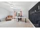 Bright bedroom featuring a vaulted ceiling, chalkboard wall, and neutral carpeting at 1916 Dugan Dr, Charlotte, NC 28270