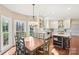 View of eat-in kitchen featuring a modern light fixture, and stainless steel appliances at 1916 Dugan Dr, Charlotte, NC 28270