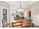 View of eat-in kitchen featuring a modern light fixture, and stainless steel appliances at 1916 Dugan Dr, Charlotte, NC 28270