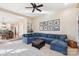 The living room is adjacent to the kitchen and features a large sectional couch at 1916 Dugan Dr, Charlotte, NC 28270