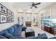 Bright and airy living room featuring a fireplace, built-in shelves, and a neutral color scheme at 1916 Dugan Dr, Charlotte, NC 28270