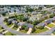 Beautiful aerial view of a neighborhood featuring well-manicured lawns and mature trees with convenient street access at 1963 Wexford Ct, Gastonia, NC 28054