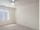 Bright bedroom with neutral walls, carpet, ceiling fan, and window at 1963 Wexford Ct, Gastonia, NC 28054