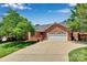 Charming brick home featuring an attached two-car garage and well-maintained landscaping at 1963 Wexford Ct, Gastonia, NC 28054