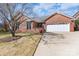 Charming brick home with well-maintained lawn and attached two-car garage at 1963 Wexford Ct, Gastonia, NC 28054